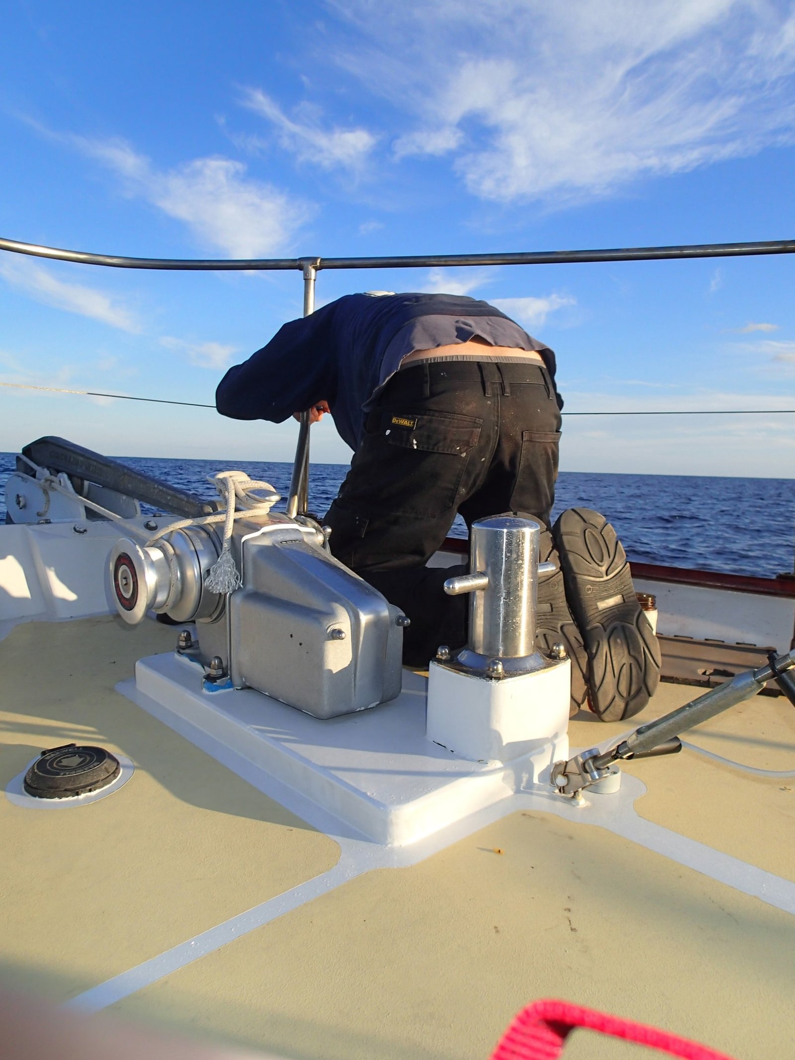 Working the anchor windlass